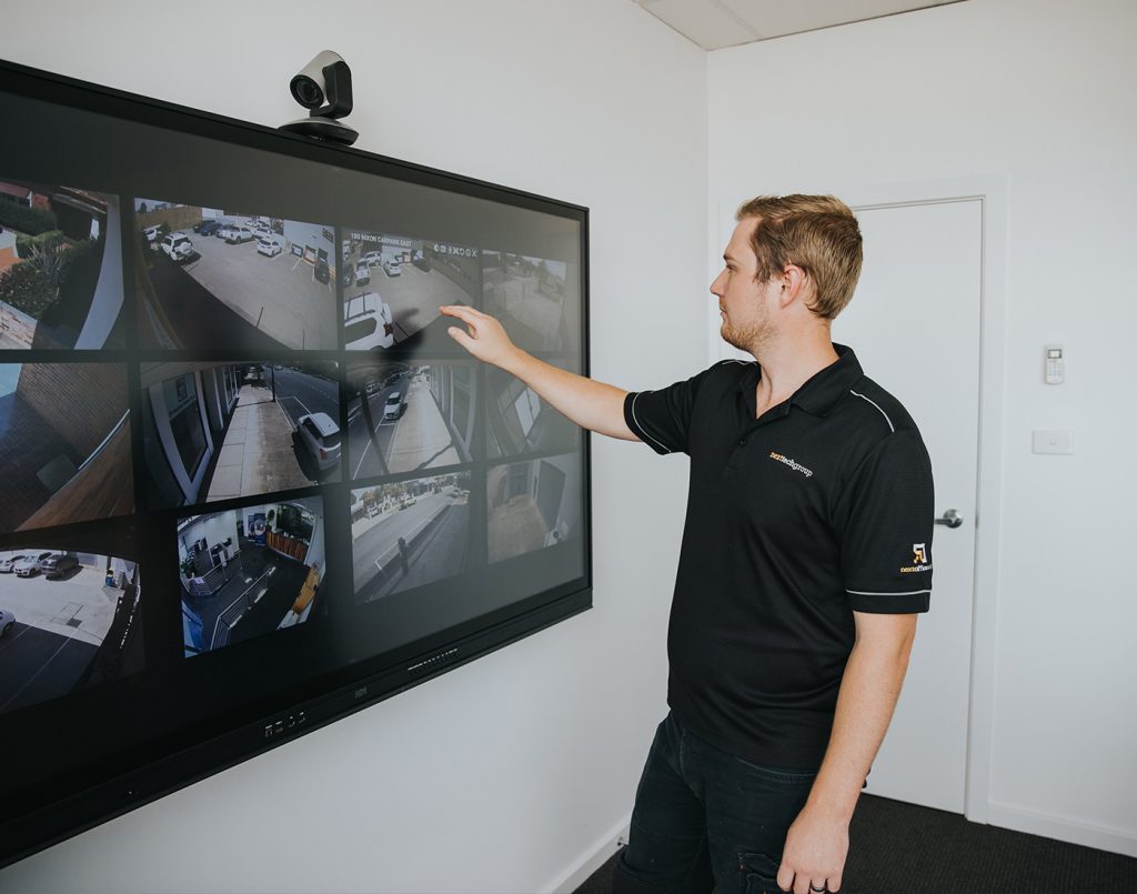 man using interactive touch screen with security software